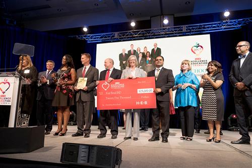 Board accepting award Board accepting award